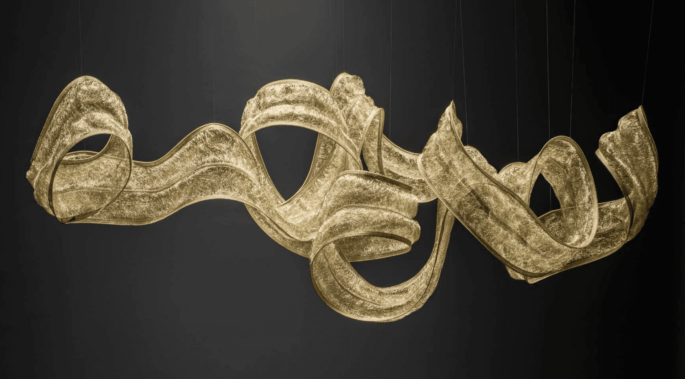 Abstract view of intricate Italian designer lighting representing the creative collaboration process.